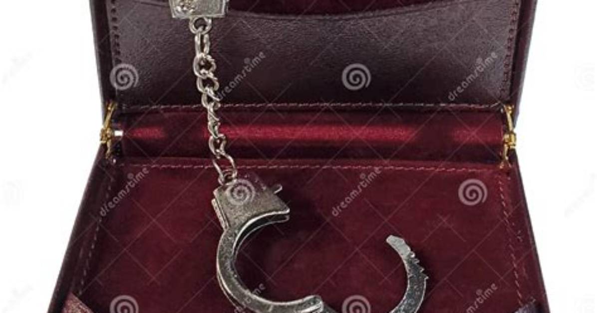 Luggage and Handcuffs Inside The